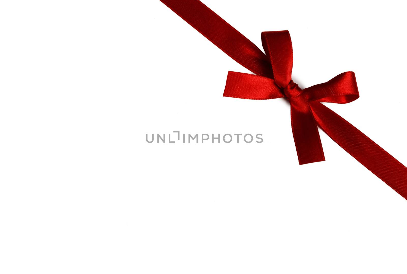 Red gift bow isolated on white background