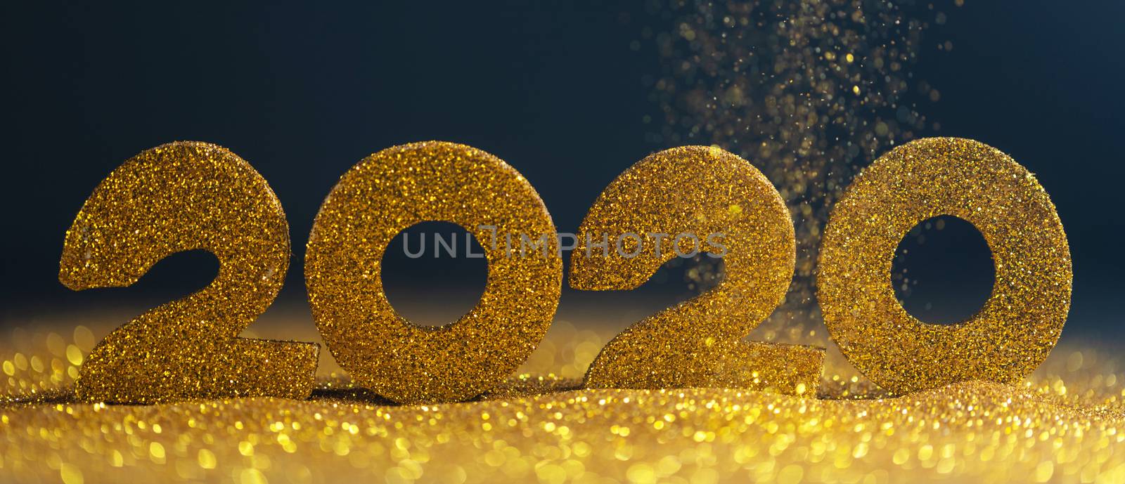 2020 New Year luxury design concept. Golden 2020 New Year horizontal template with golden glitter on blue backgound
