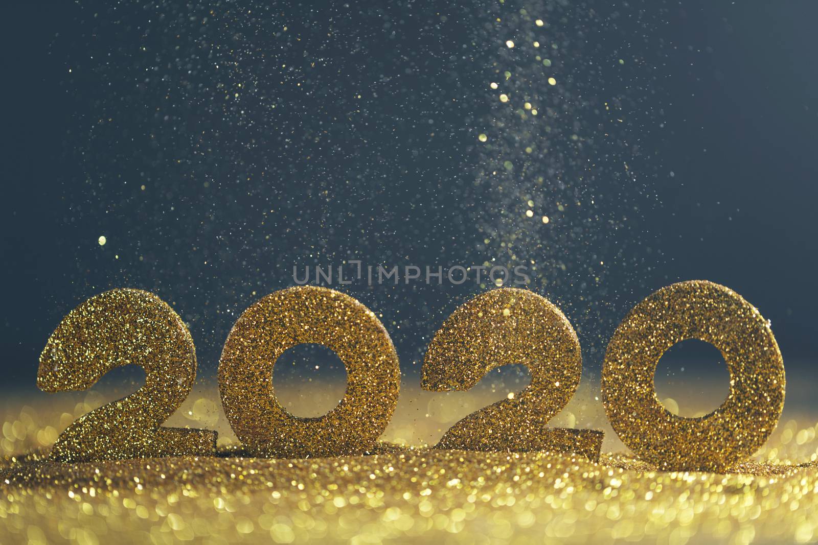 2020 New Year luxury design concept. Golden 2020 New Year horizontal template with golden glitter on blue backgound