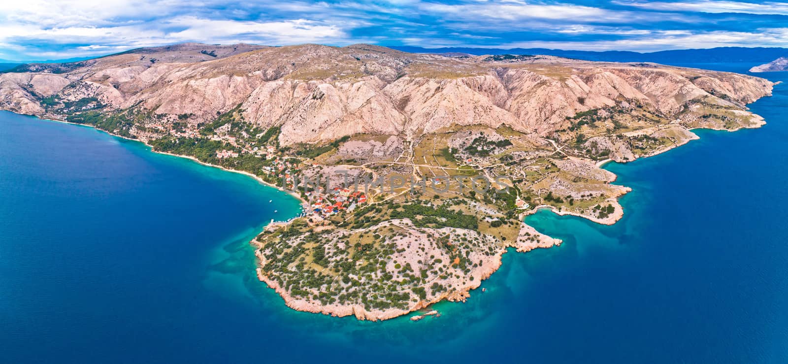 Stara Baska. Aerial panoramic view of Stara Baska village and stone desert landscape of Krk island, Kvarner bay of Croatia