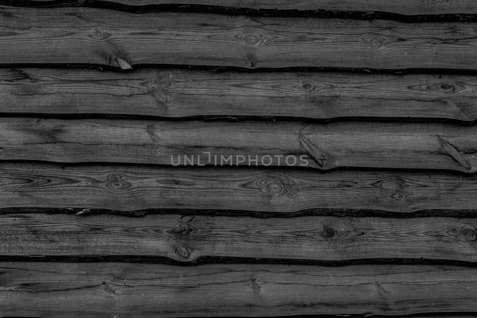 Dark wooden boards background. Wall floor or fence exterior design. Natural wood material backdrop