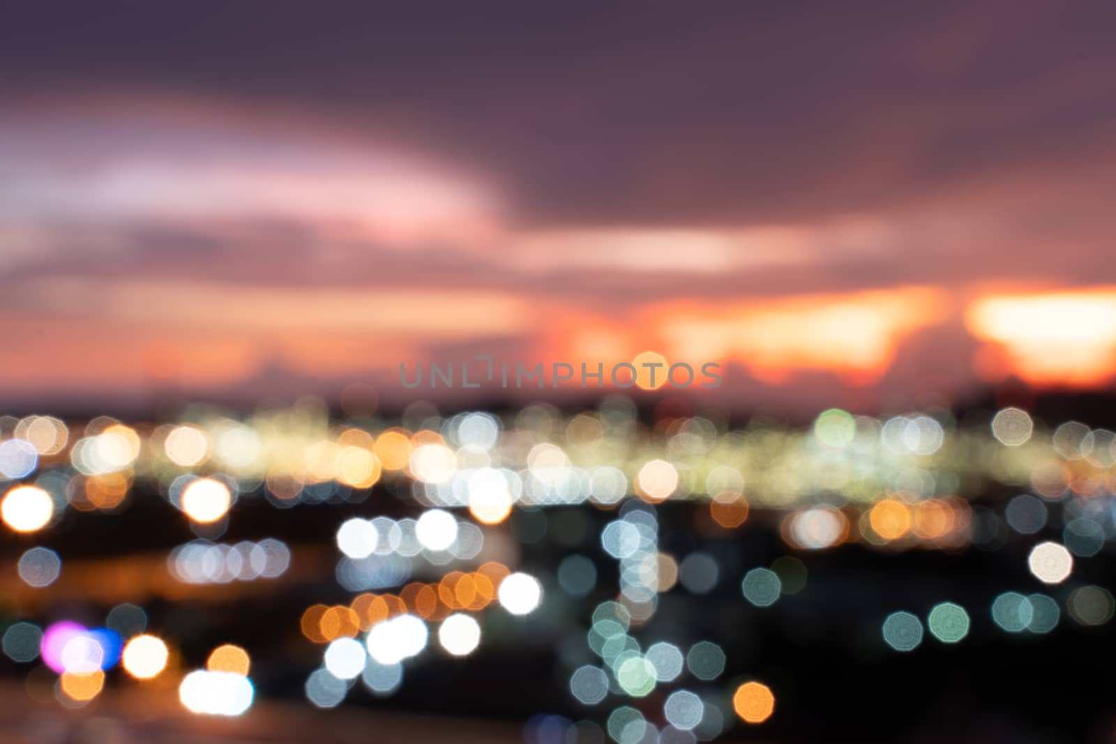 The Abstract urban night light bokeh defocused background