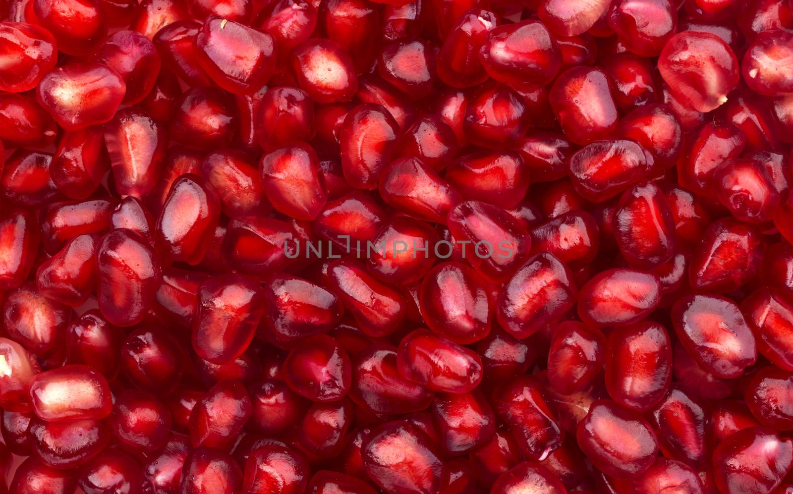 Close-up of pomegranate seeds texture, top view