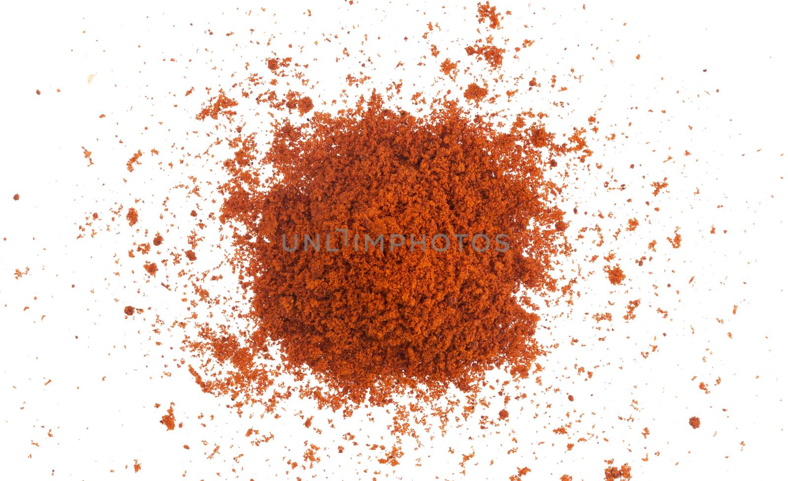 Pile of red paprika powder isolated on white background. Top view by xamtiw