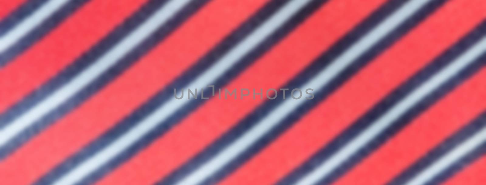 Defocused background of a necktie texture. Intentionally blurred post production for bokeh effect
