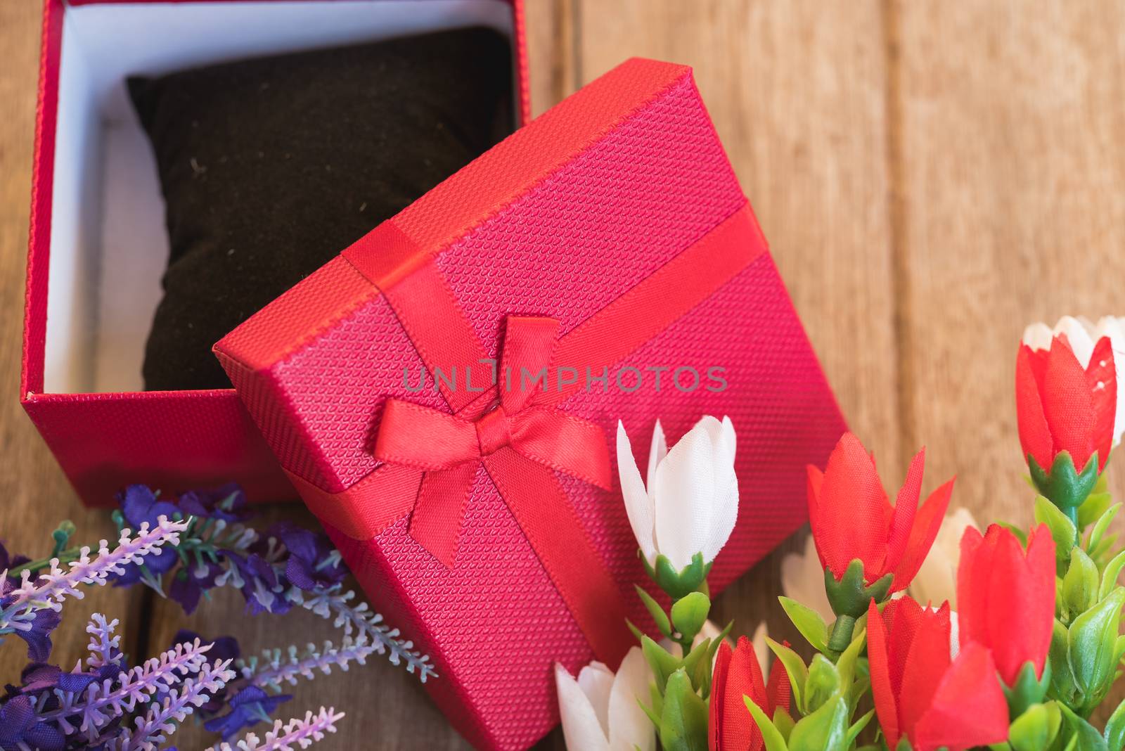 Fower and gift box on wooden background with copy space, valentine day concept
