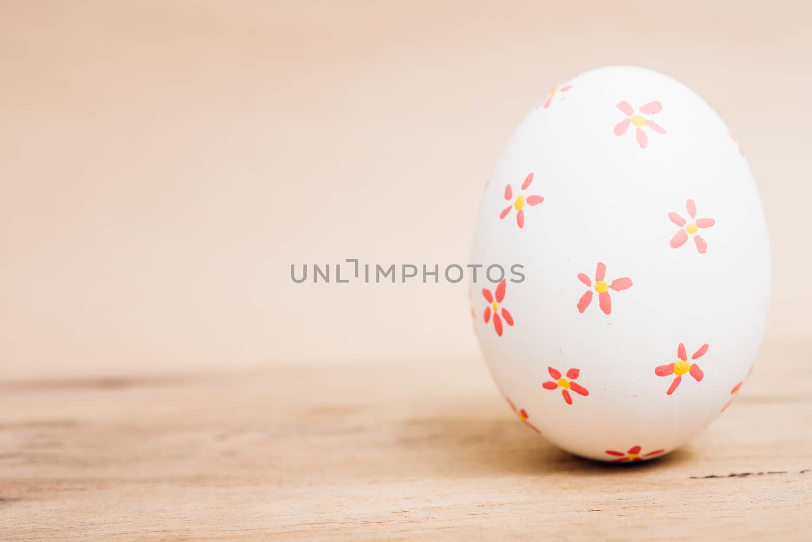 Beautiful Easter White egg on wooden background, Easter day concept