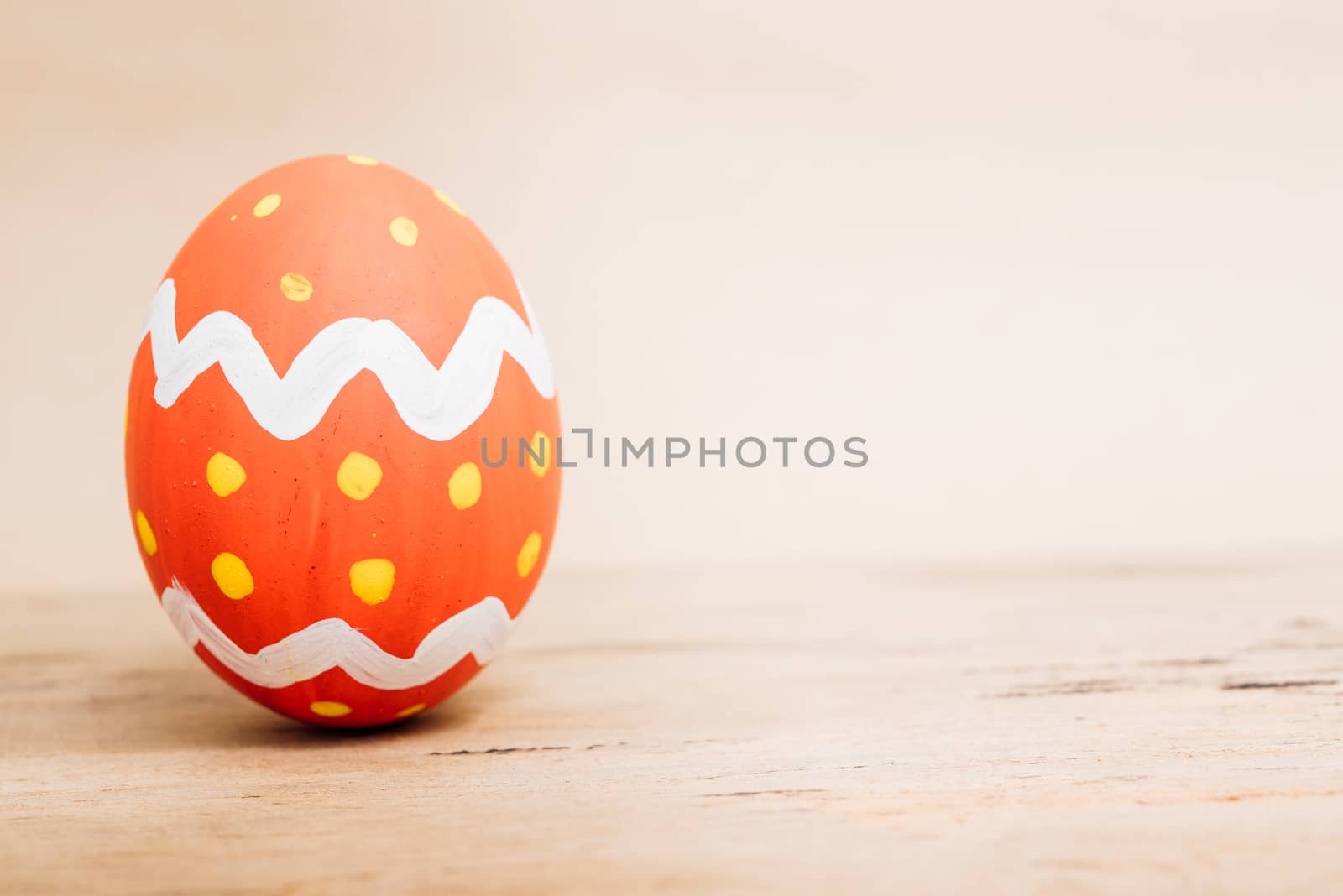 Beautiful Easter Red egg on wooden background, Easter day concept