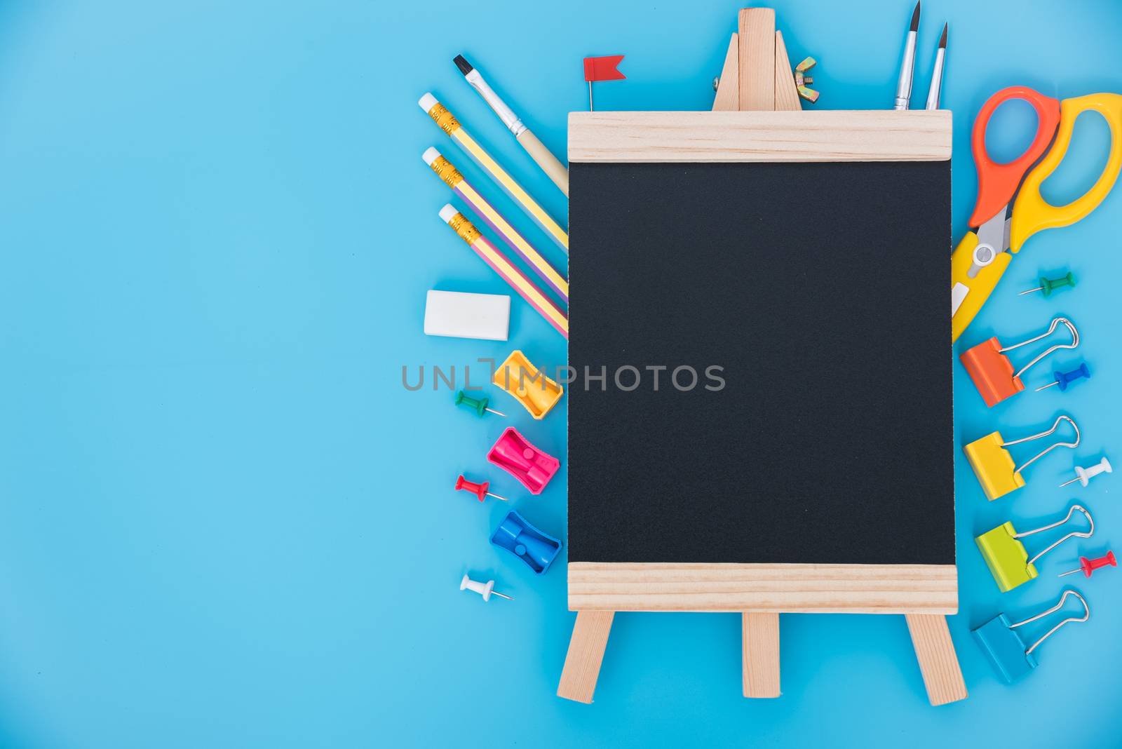 Top view tool set for education children on blue  background, back to school concept