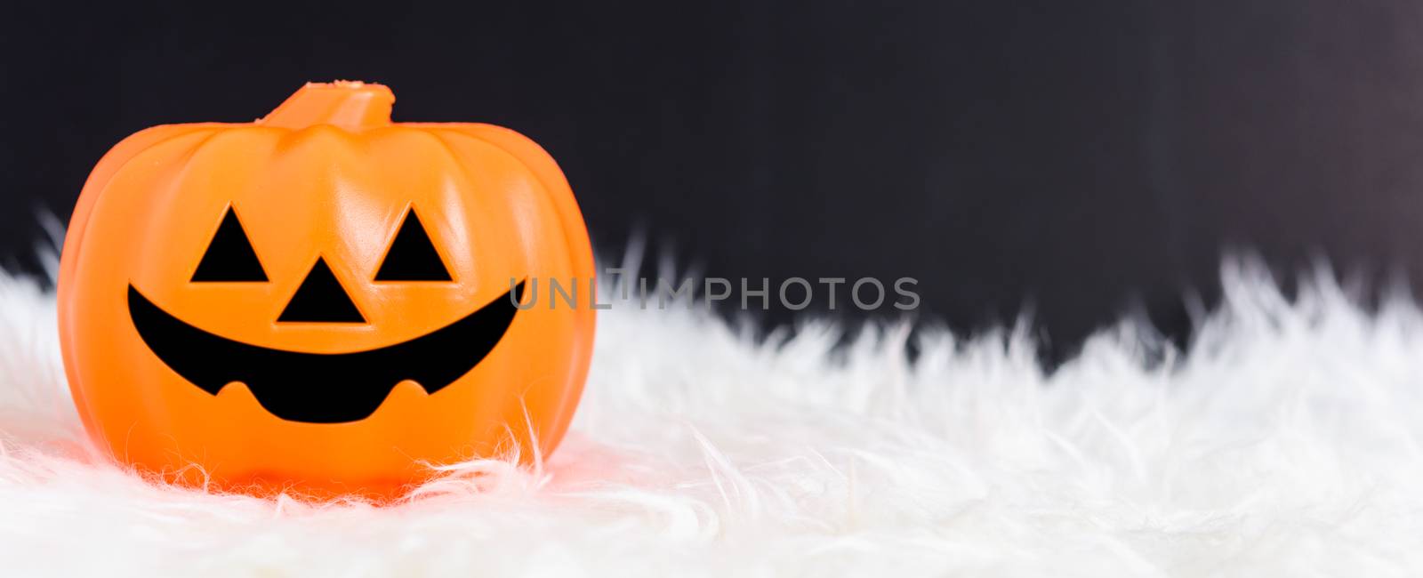 Pumpkin Jack creepy in Halloween day concept on black background