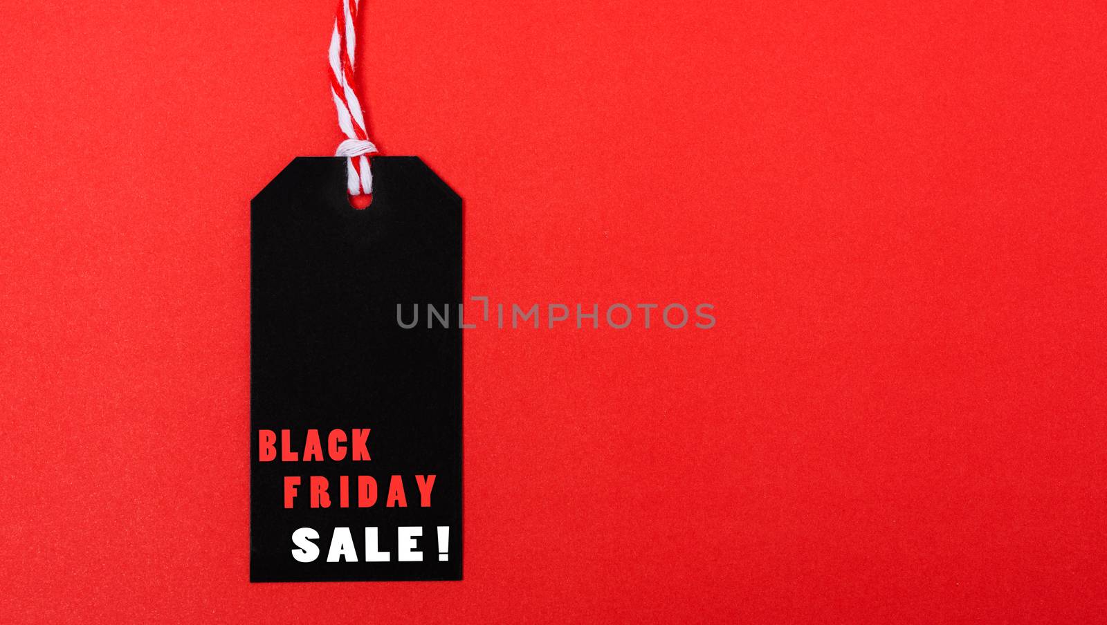 Online shopping, Promotion Black Friday Sale text on black tag by Sorapop
