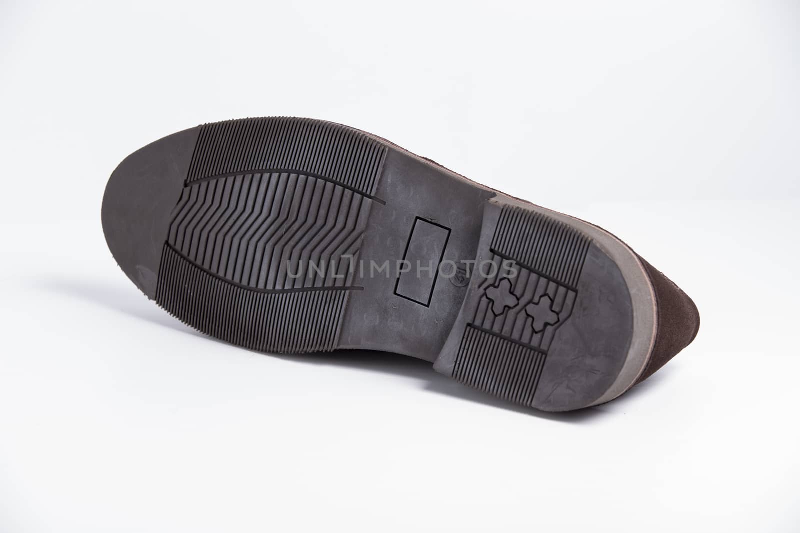 Male brown leather shoe on white background, isolated product, top view.