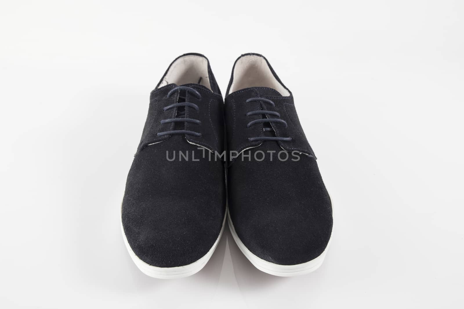 Male blue leather shoe on white background, isolated product.