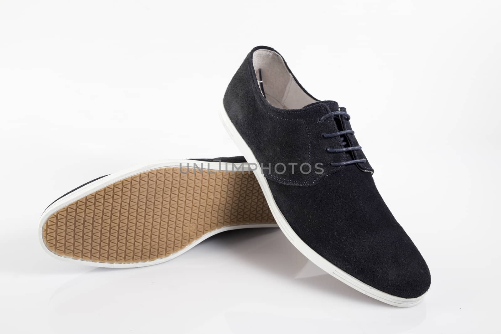 Male blue leather shoe on white background, isolated product.