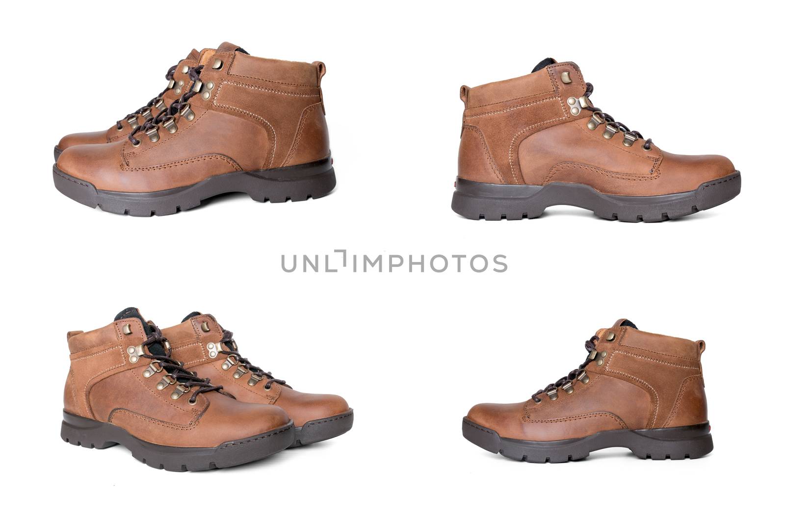 Group of brown boots on white background, isolated product. by GeorgeVieiraSilva