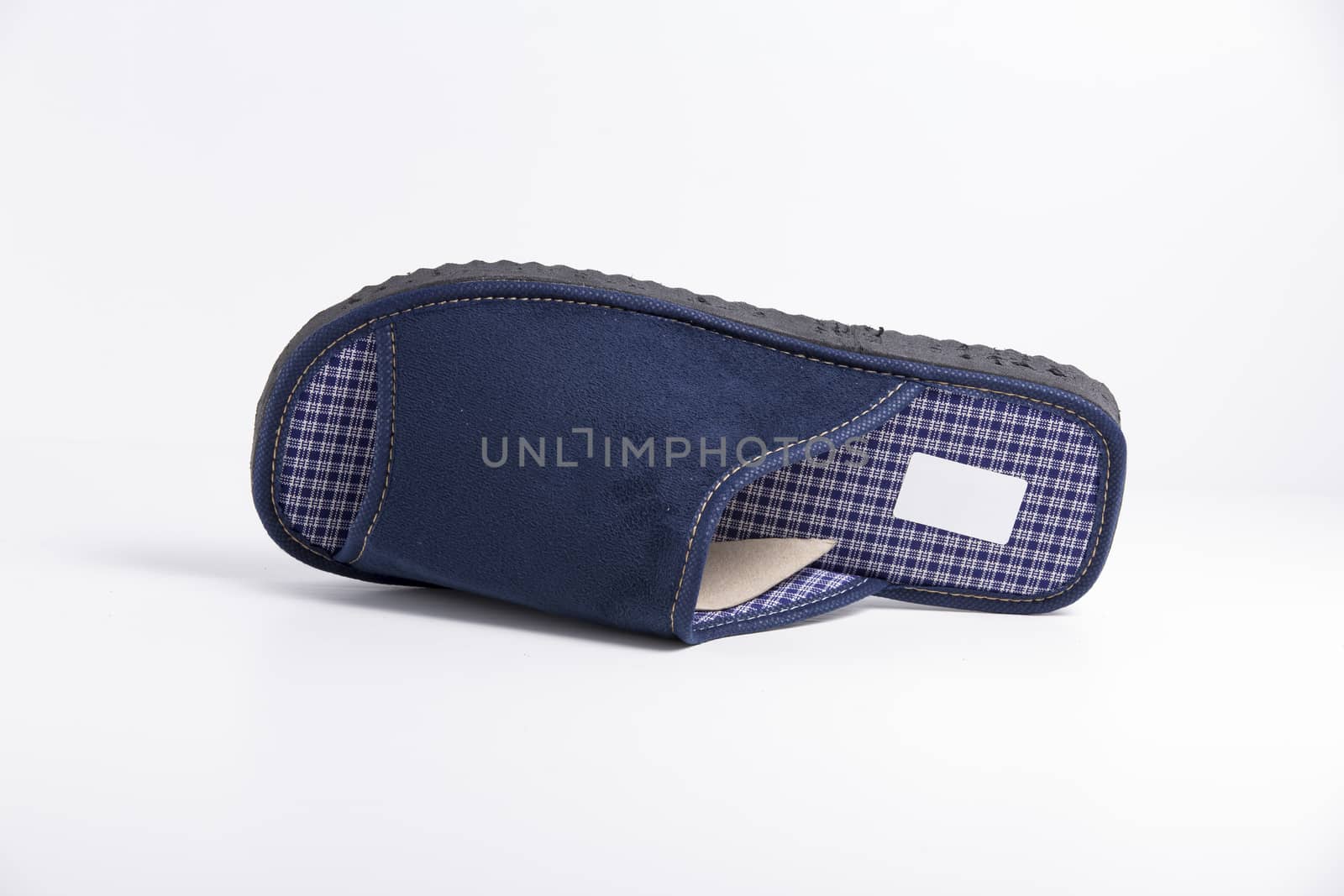 Male blue slipper on white background, isolated product.