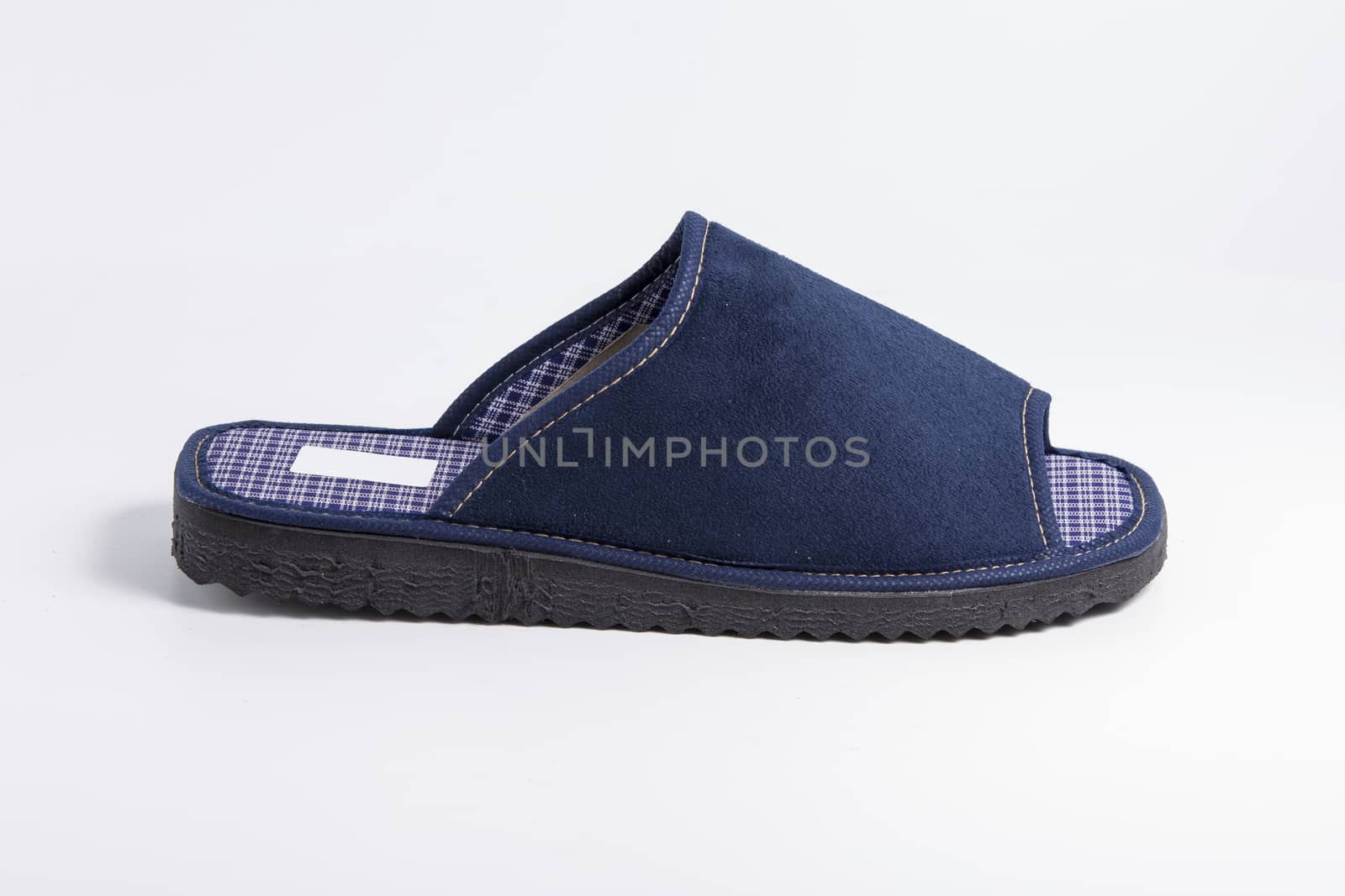 Male blue slipper on white background, isolated product.