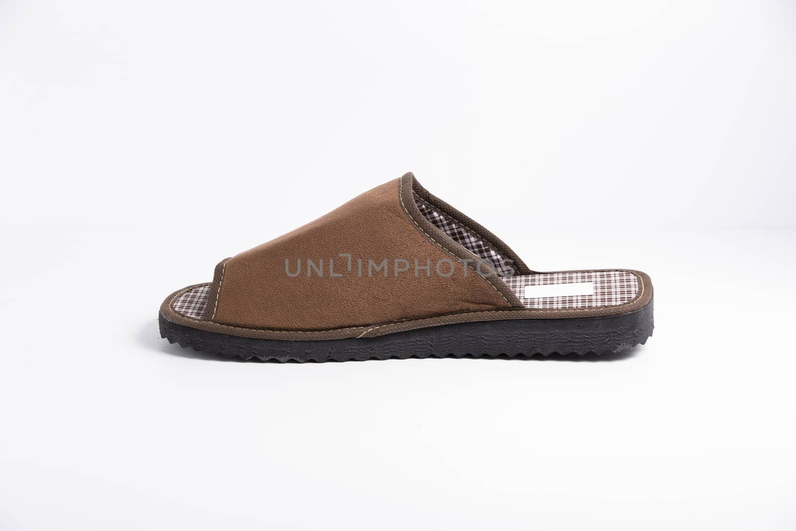 Male brown slipper on white background, isolated product.