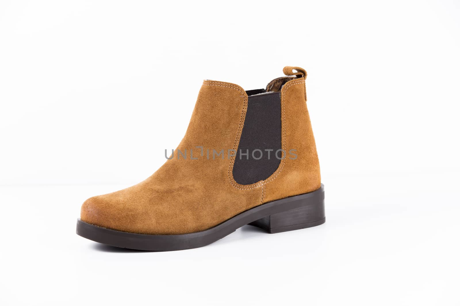 Brown leather boot on white background, isolated product.