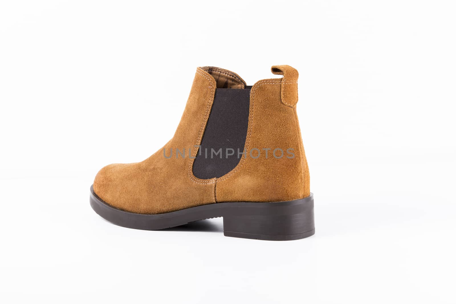 Brown leather boot on white background, isolated product. by GeorgeVieiraSilva