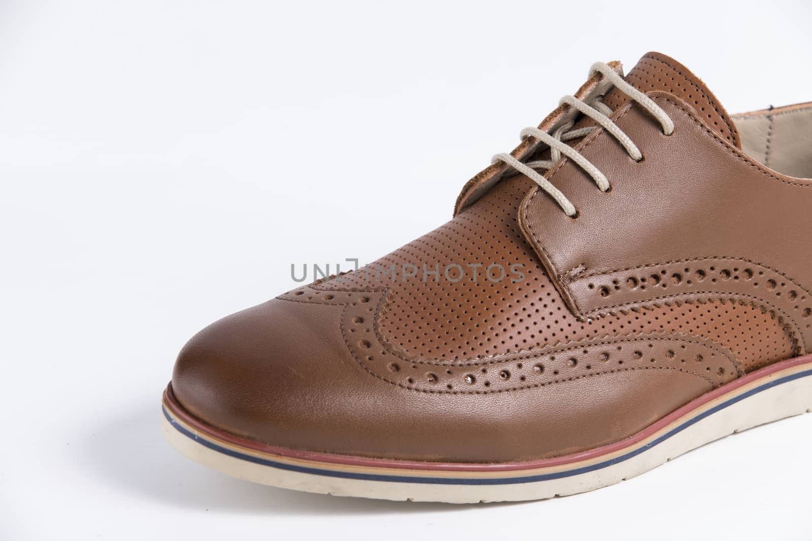 Brown leather shoe on white background, isolated product. by GeorgeVieiraSilva