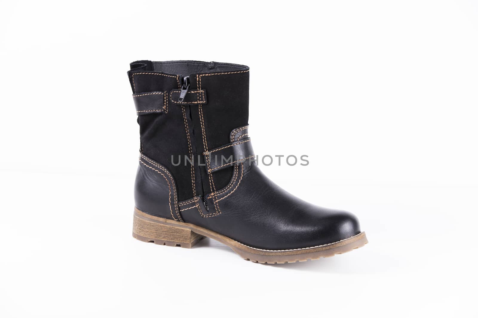 Black boot on white background, isolated product. by GeorgeVieiraSilva