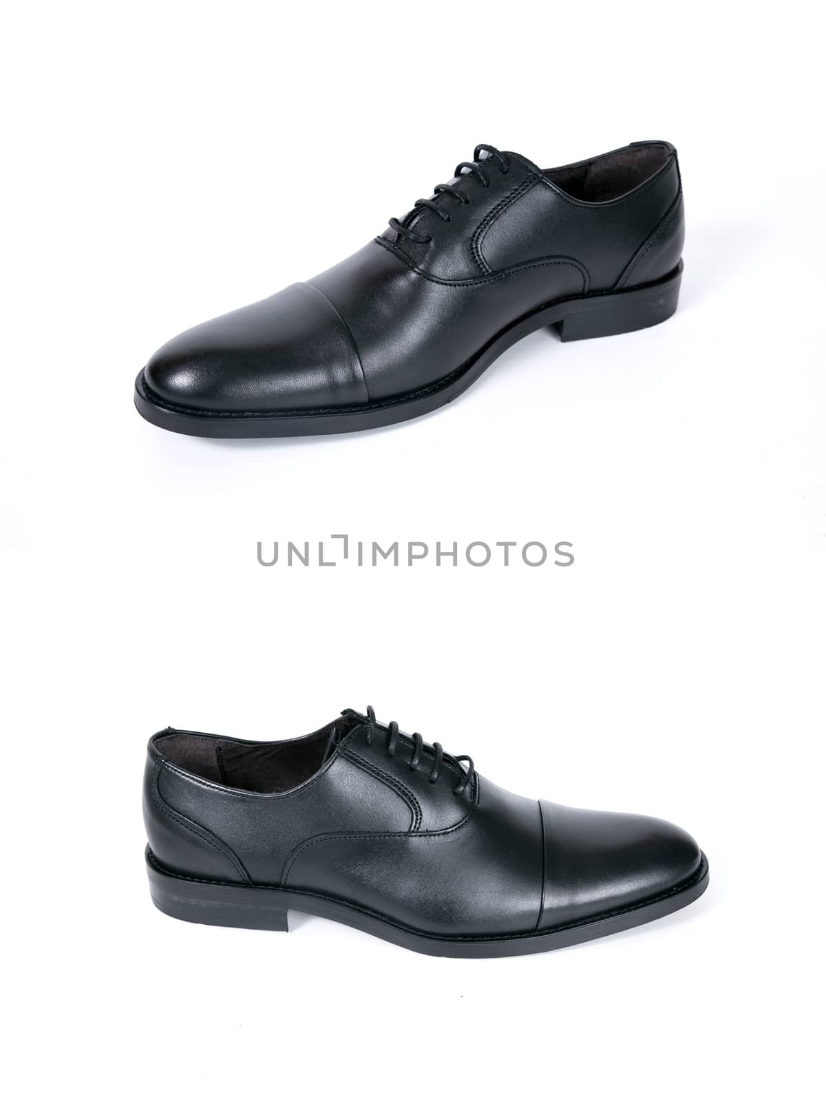 Group of black shoes on white background, isolated product.