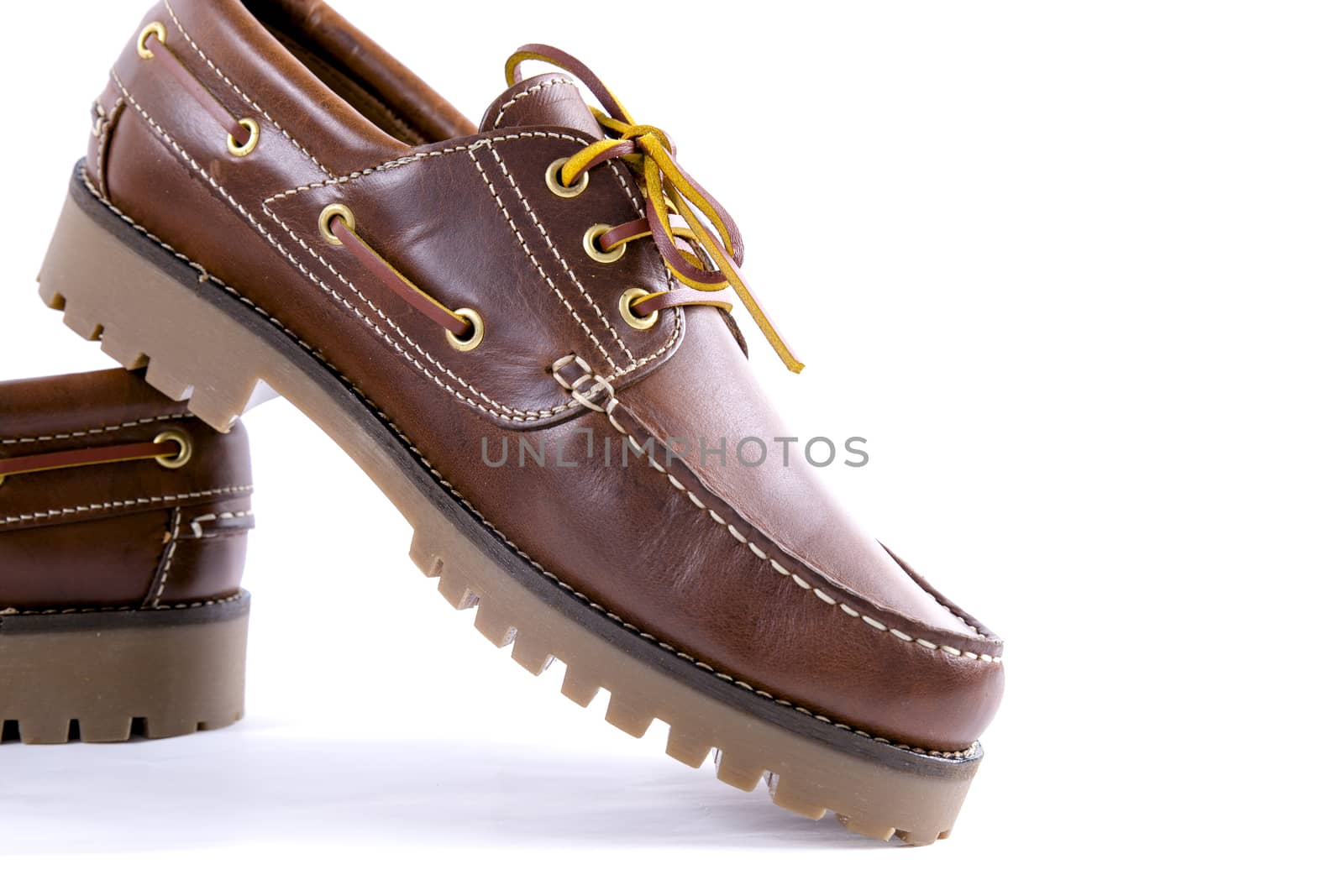 Brown leather shoe on white background, isolated product.