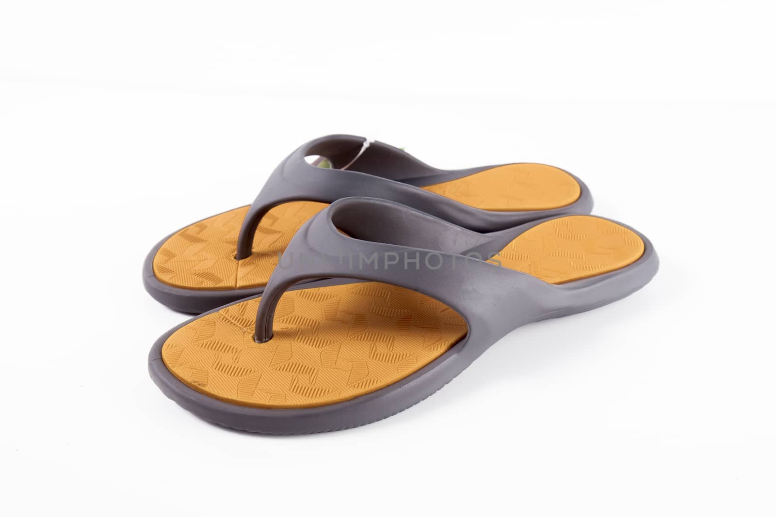 Pair of black slipper on white background, isolated product.