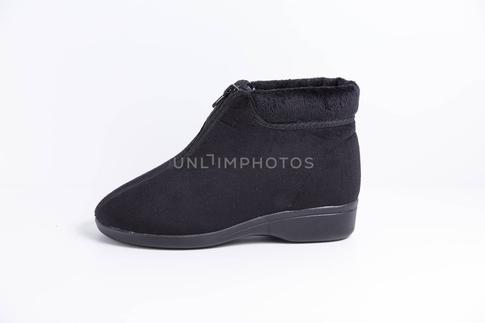 Black boot on white background, isolated product.