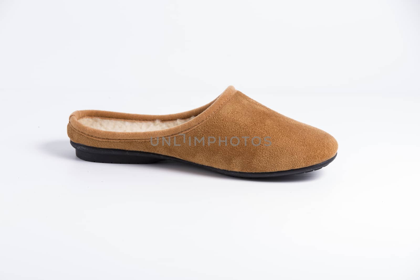 Brown slipper on white background, isolated product. by GeorgeVieiraSilva