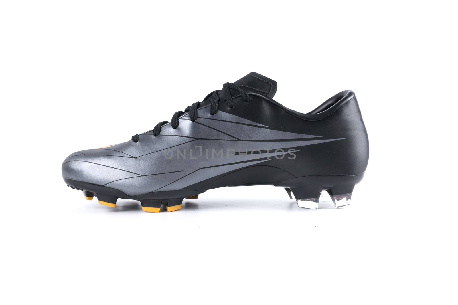 Black sneaker soccer on white background, isolated product.