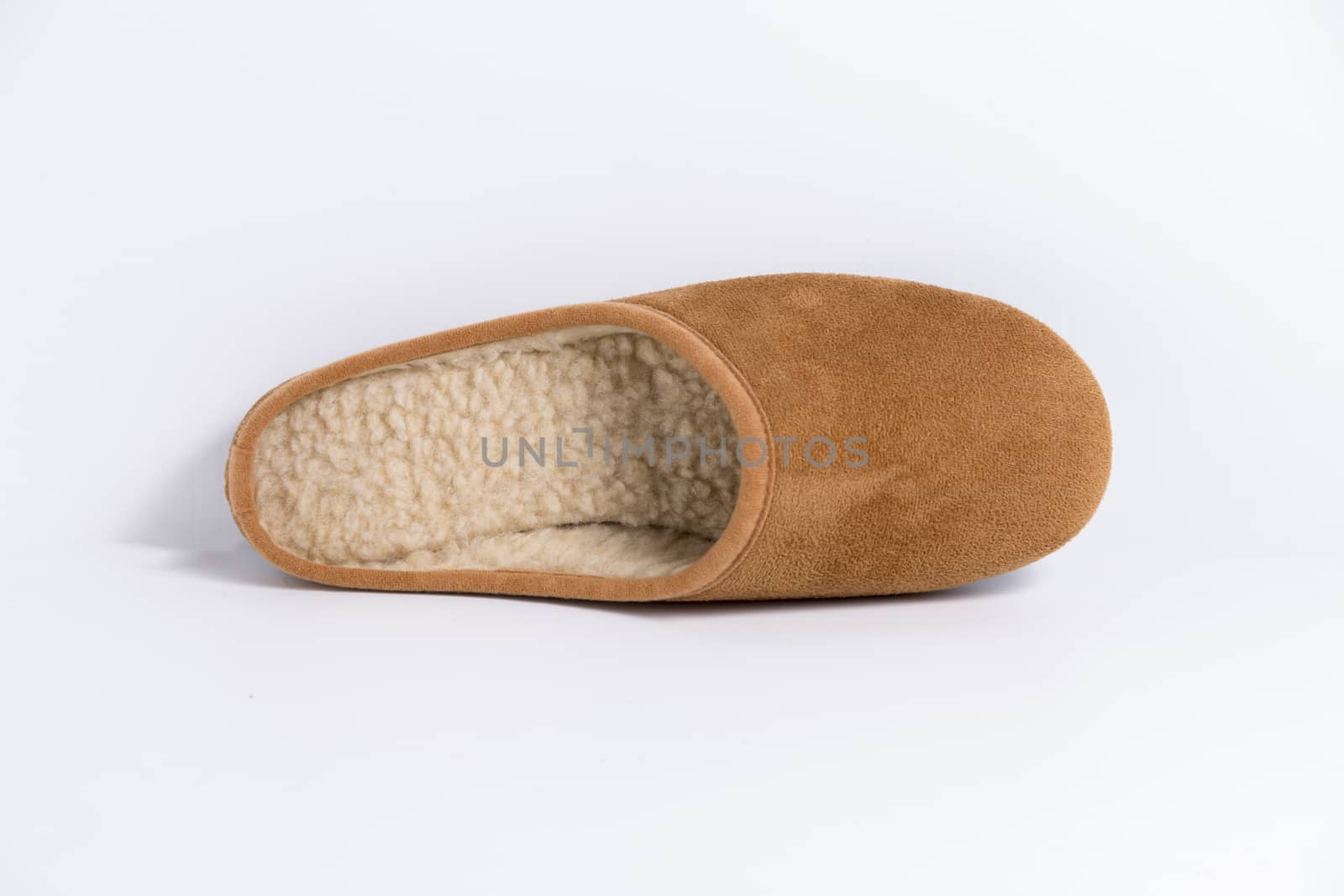 Brown slipper on white background, isolated product.