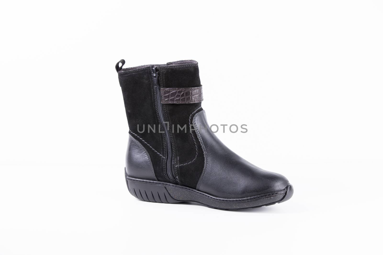 Black leather boots on white background, isolated product.