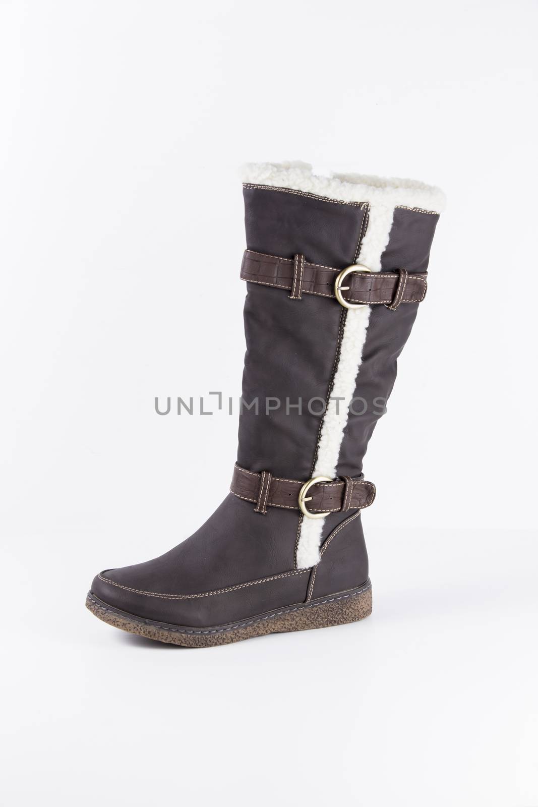Brown leather boots on white background, isolated product.