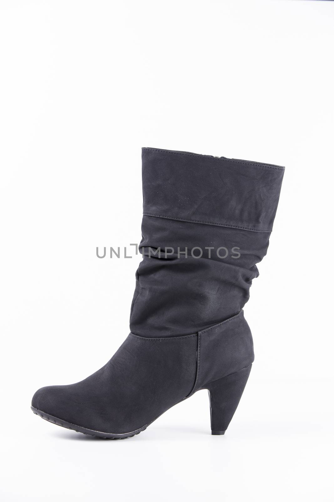 Black leather boots on white background, isolated product.