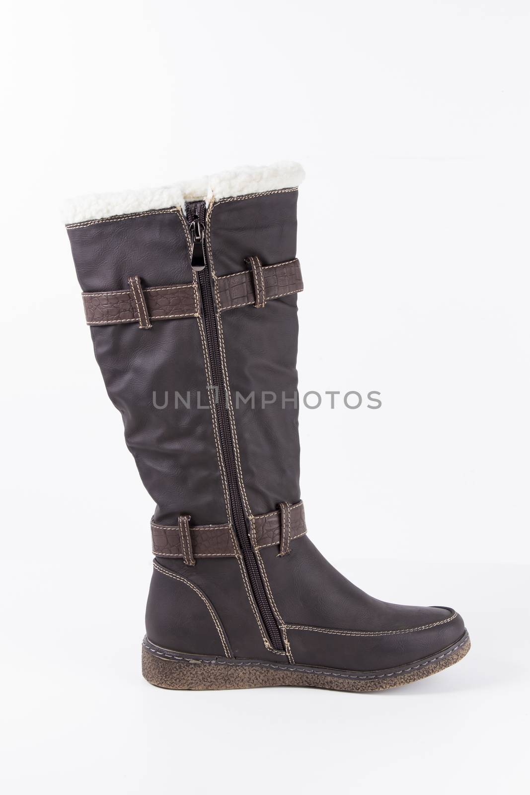 Brown leather boots on white background, isolated product.