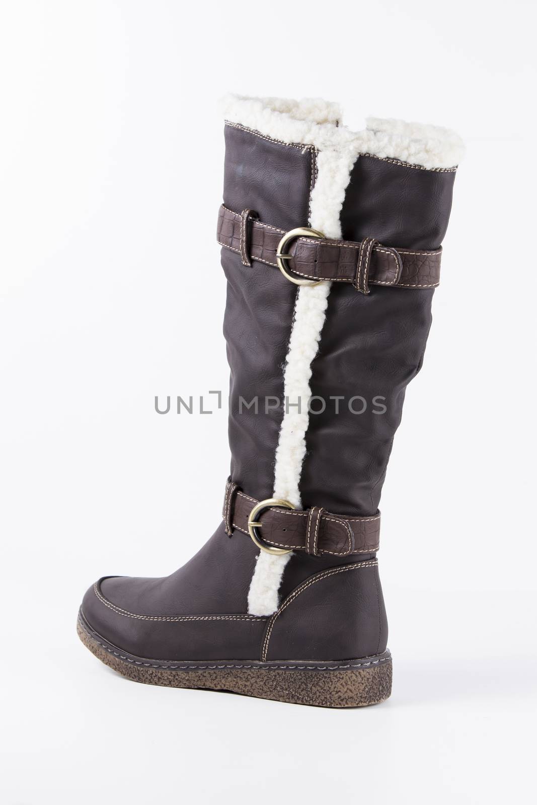 Brown leather boots on white background, isolated product.