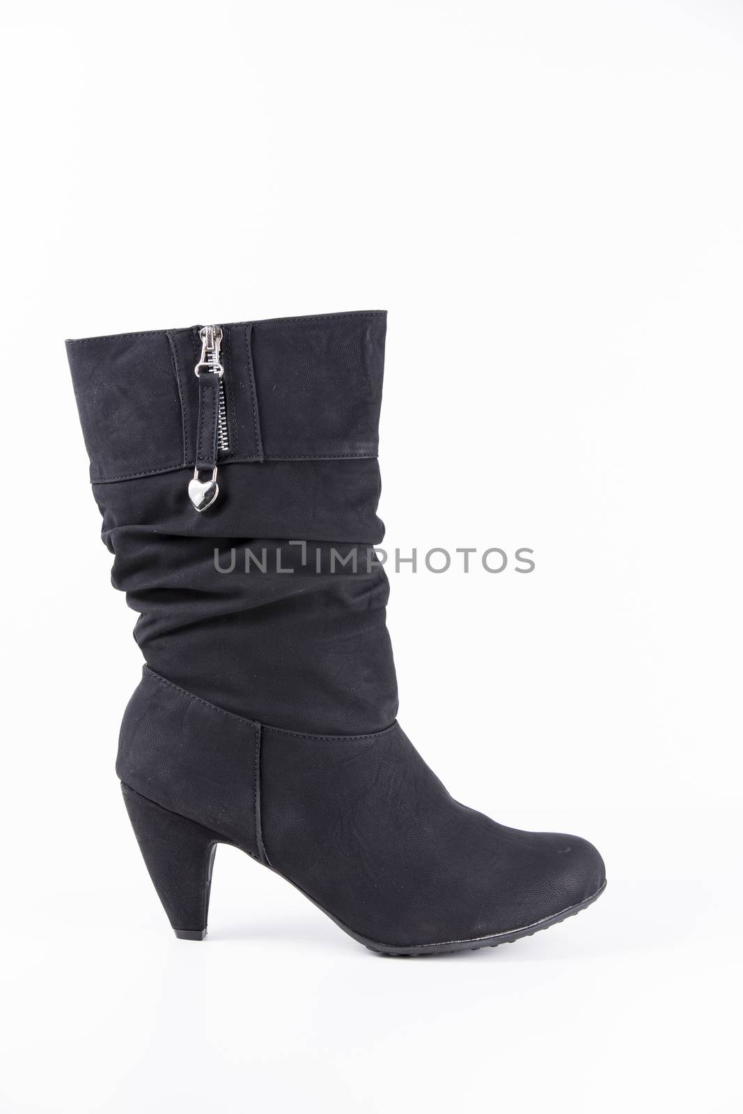 Black leather boots on white background, isolated product.