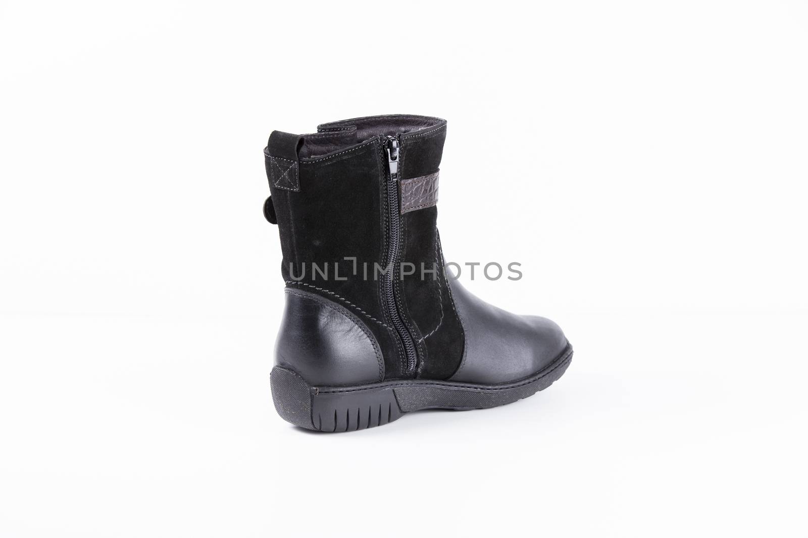 Black leather boots on white background, isolated product.