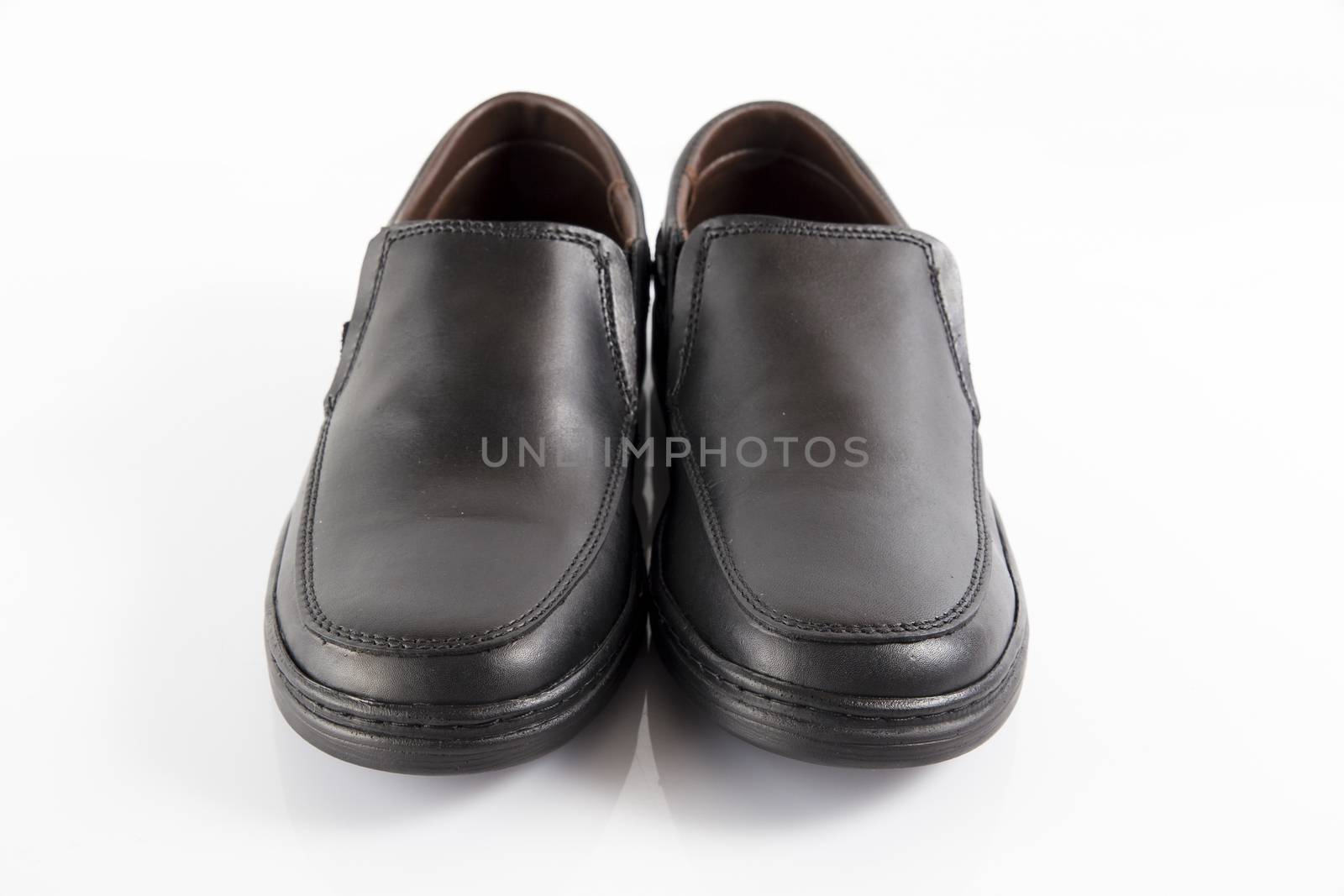 Male black leather shoes on white background, isolated product.