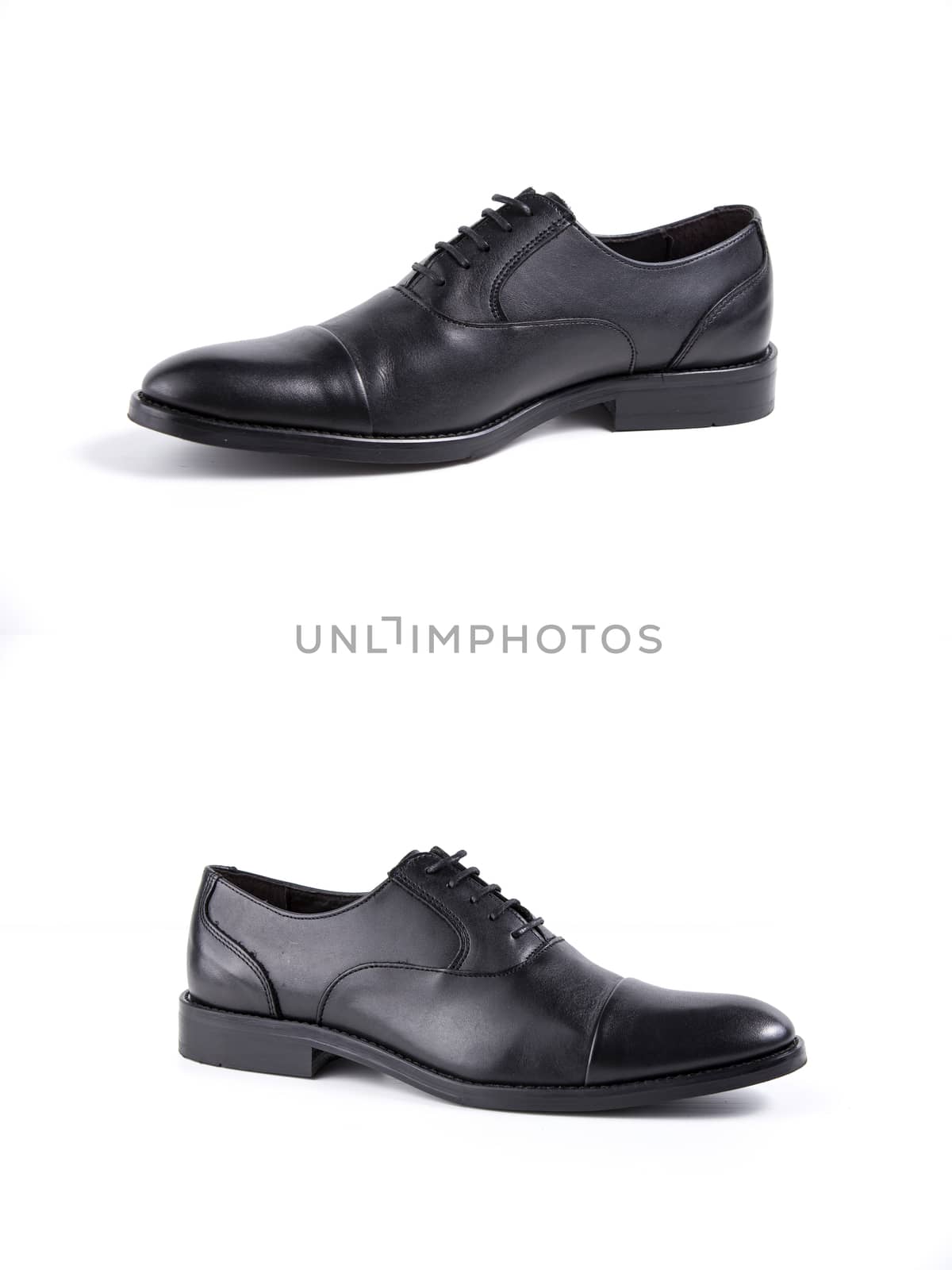 Male black leather shoes on white background, isolated product.
