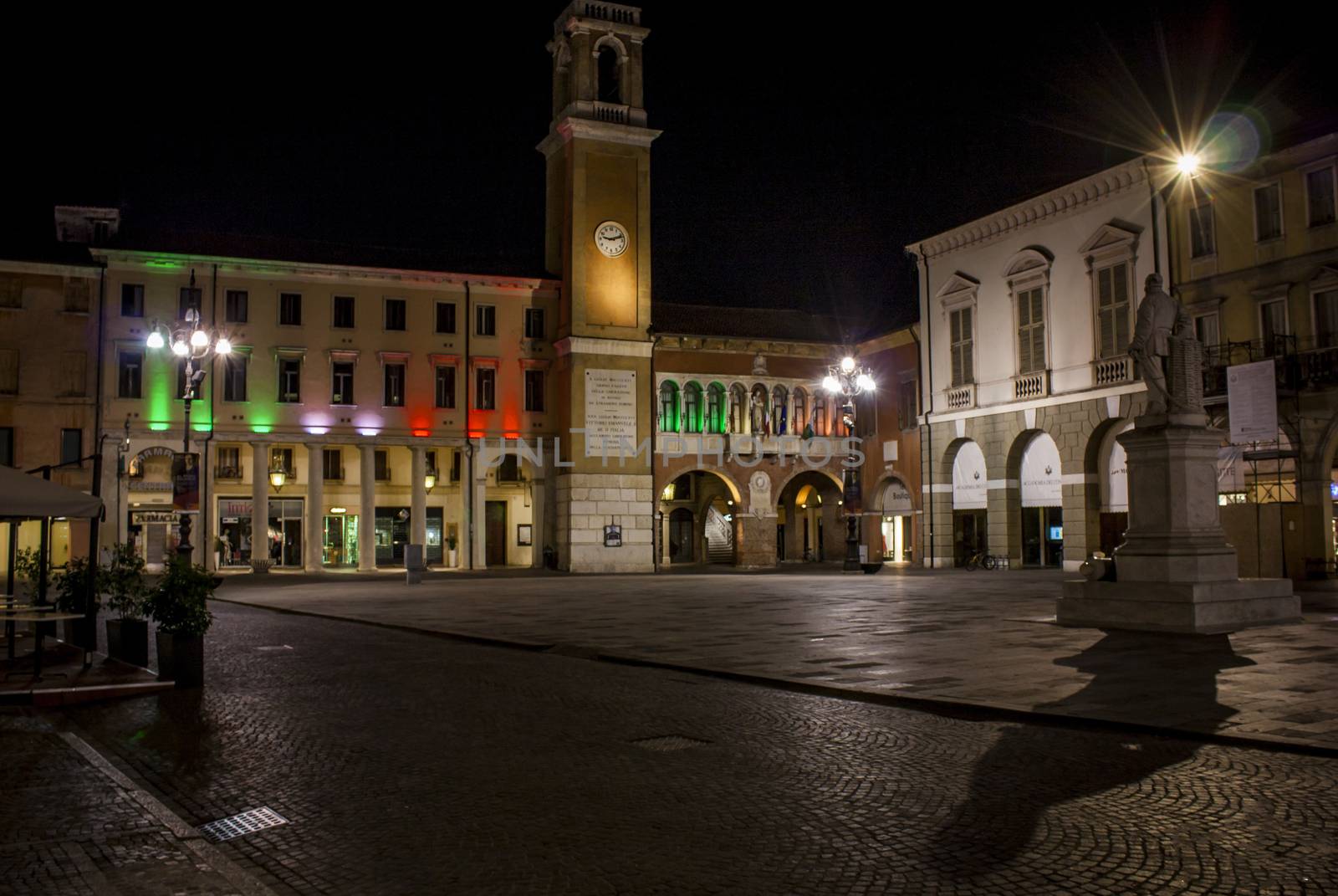 View of the historical center of Rovigo, a historic Italian city. Night landscape of the old town lit with artificial lighting.