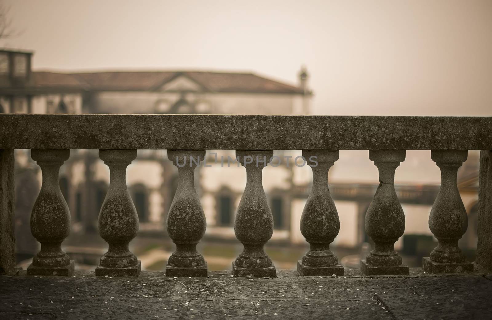 A concrete railing of a typical Italian historic building. A great symbol of the obstacles of life: Every obstacle can be overcome if the fortitude is quite large.