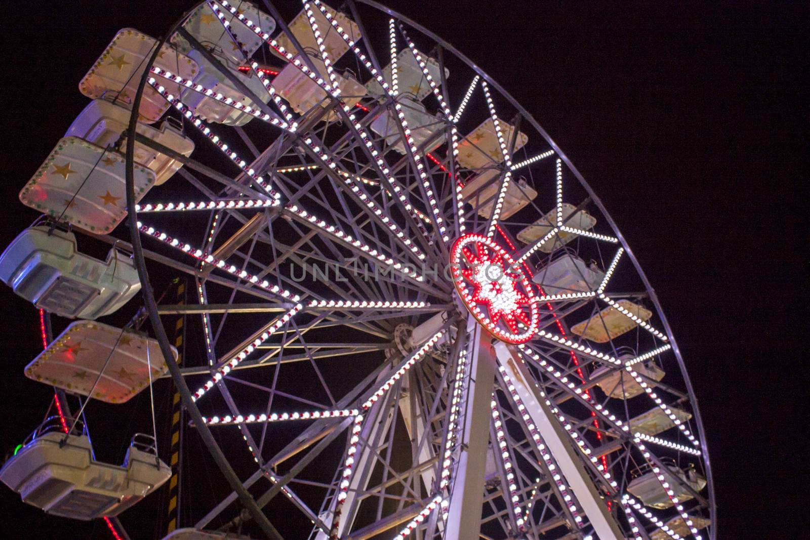 Ferris wheel in an amusement park in northern Italy.