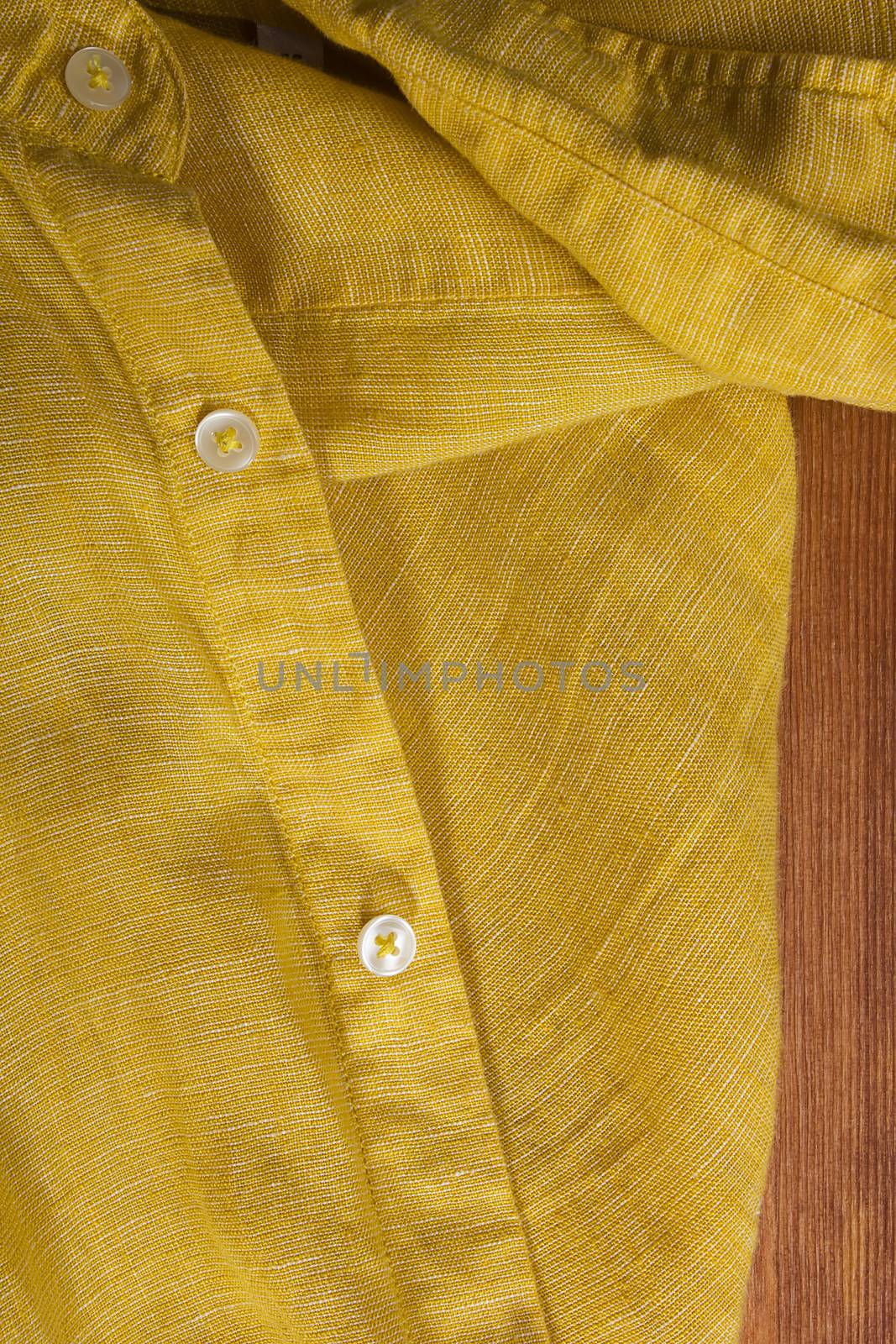 Close up of shirt yellow textile texture