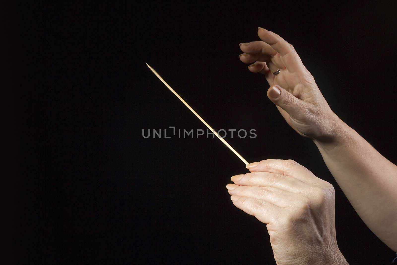 Hands of an orchestra conductor by VIPDesignUSA