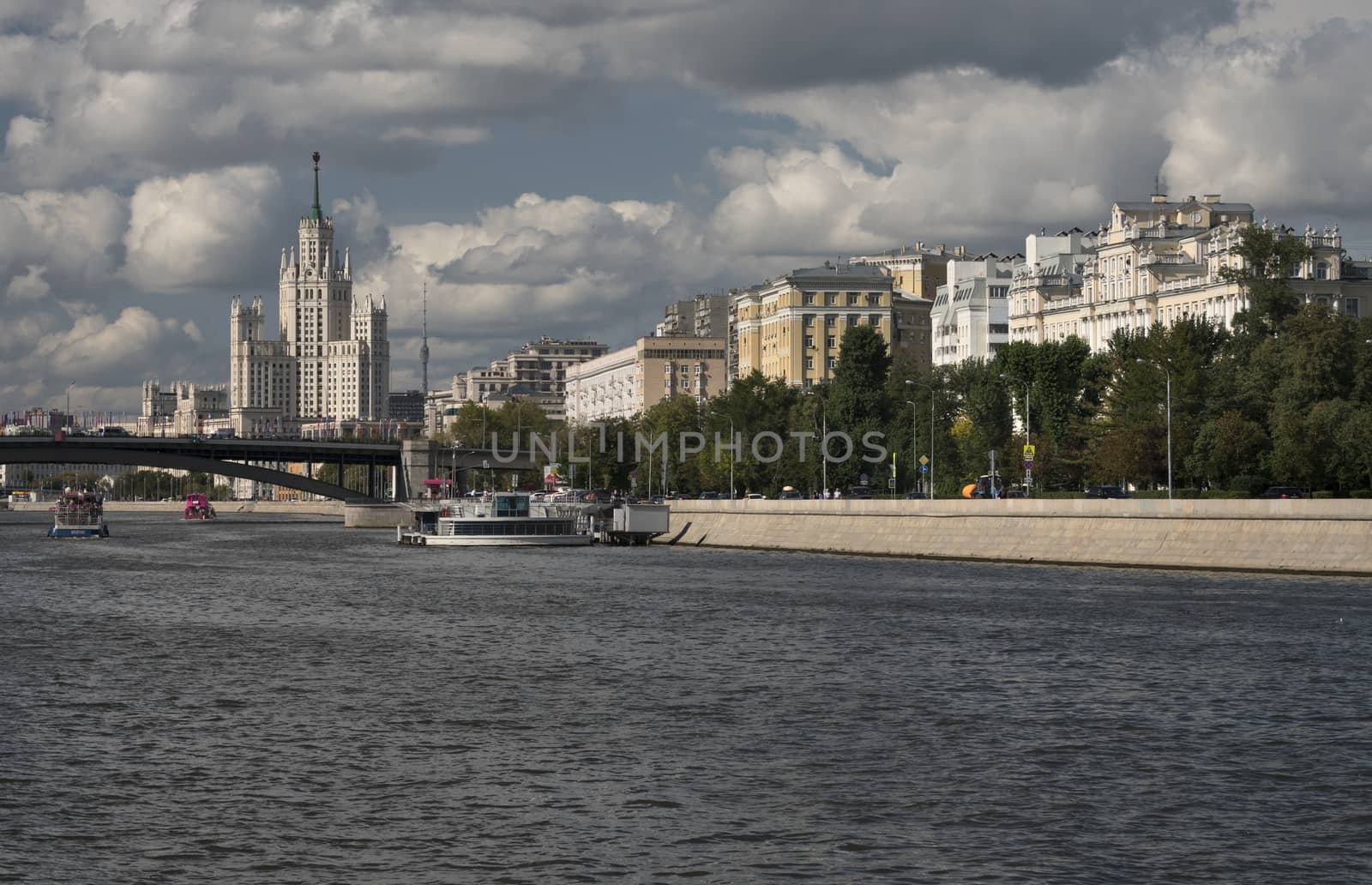 Russia, Moscow, Center of City View on River, Bridge and Buildings of Different Styles.