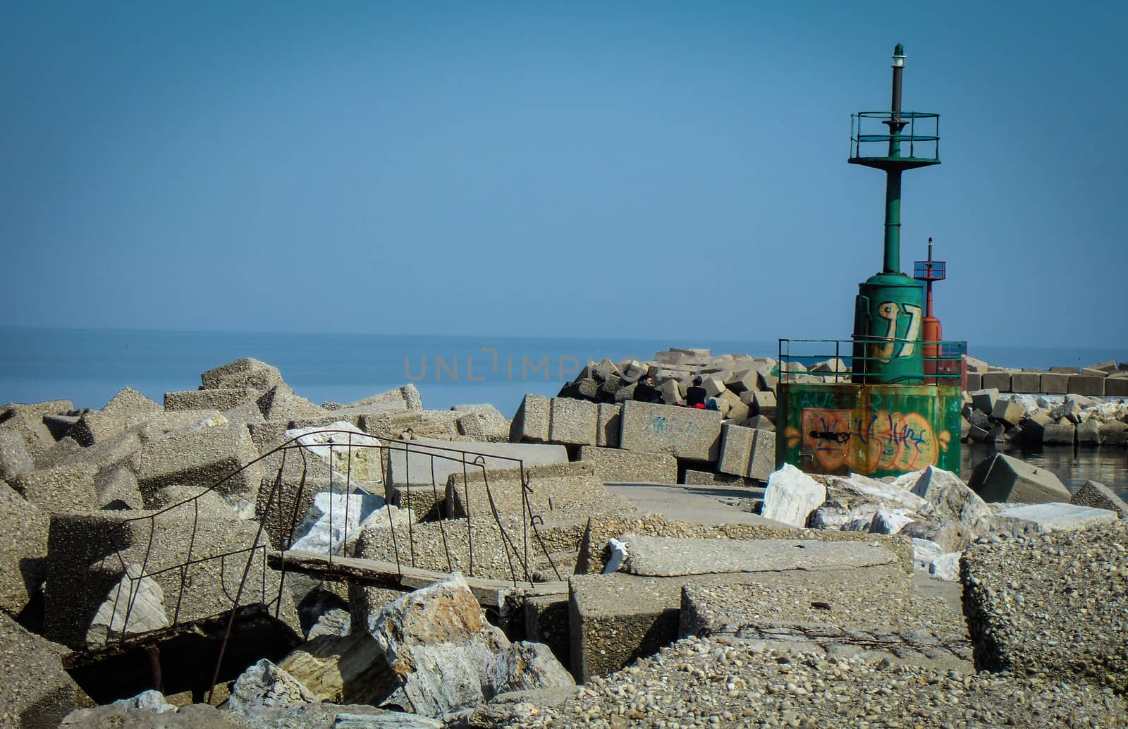 Ruins and abandonment in the port of Giulianova in Abruzzo, Italy. A port on the sea abandoned and destroyed by time.