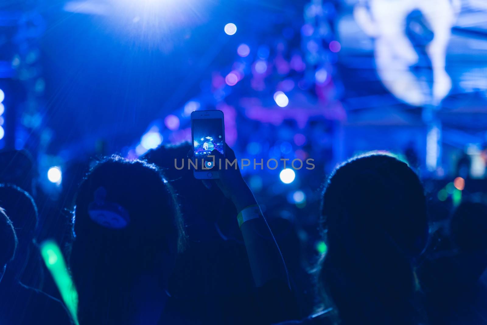 Event people live video festival music concert by hand holding smart mobile phone